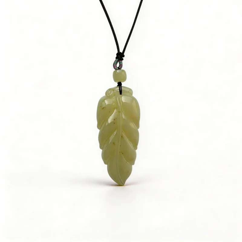 Golden Branch Jade Leaf Pendant - Fortune Symbol – clean white background product photo | QZZEN