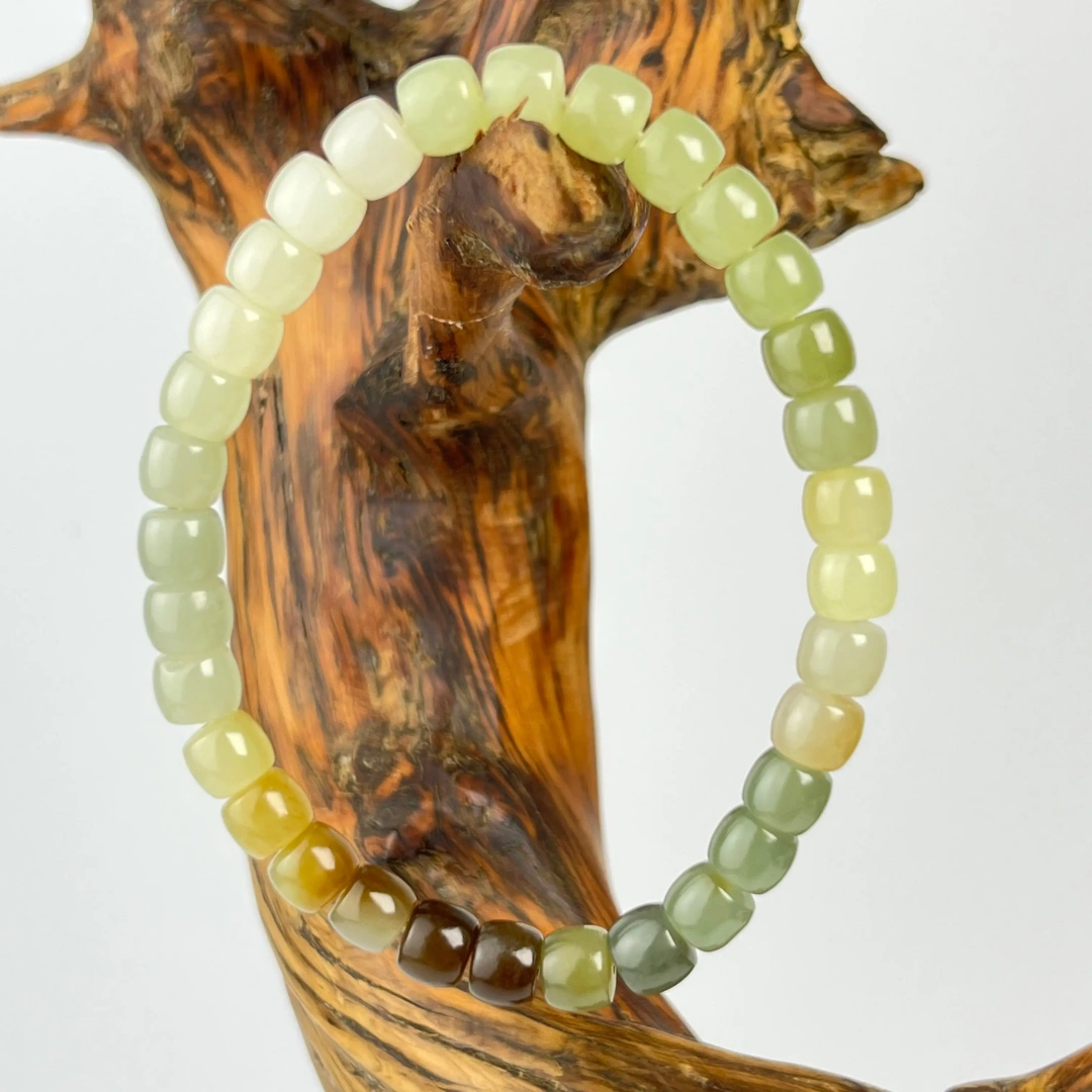 Hetian Jade Lotus Bracelet bead texture close-up with natural inclusions | QZZEN