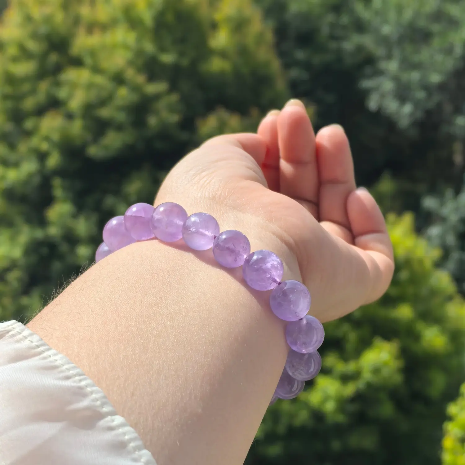 Lavender Amethyst Bracelet worn on wrist in natural light | QZZEN