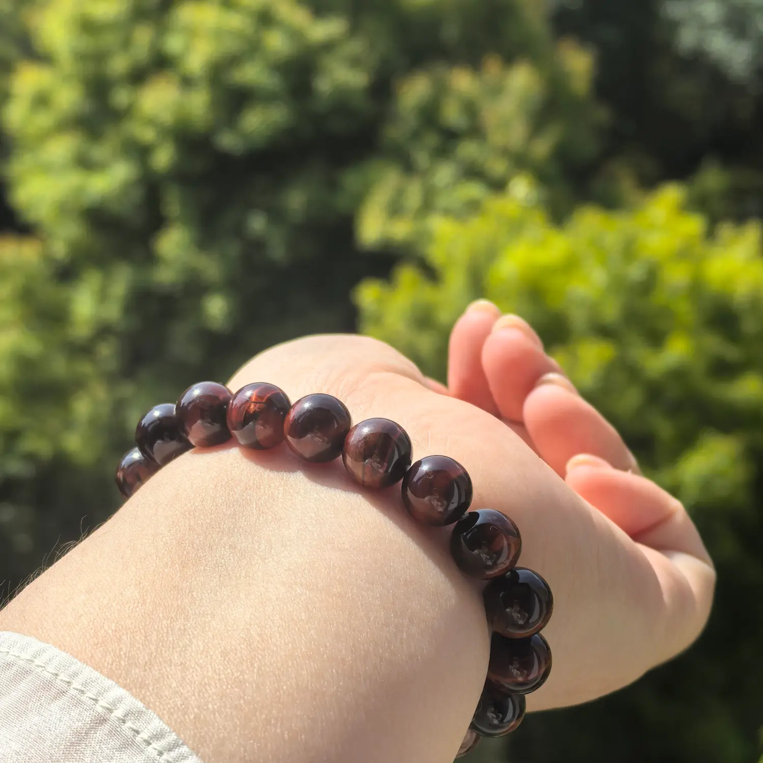 10mm Tiger Eye Bracelet worn on wrist in natural light | QZZEN