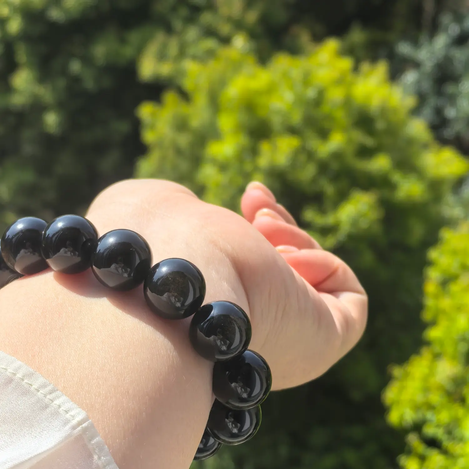 Gold Obsidian Bracelet worn on wrist in natural light | QZZEN