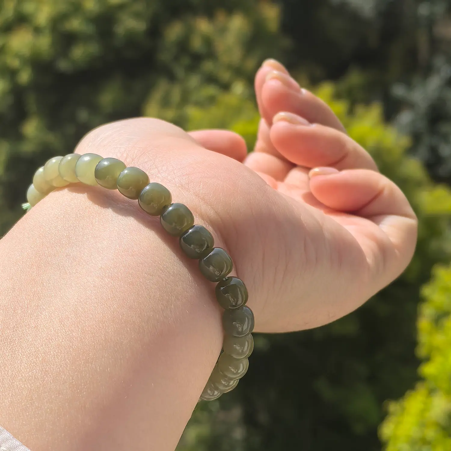 Red Agate Hetian Jade Nanhong Agate Bracelet worn on wrist in natural light | QZZEN
