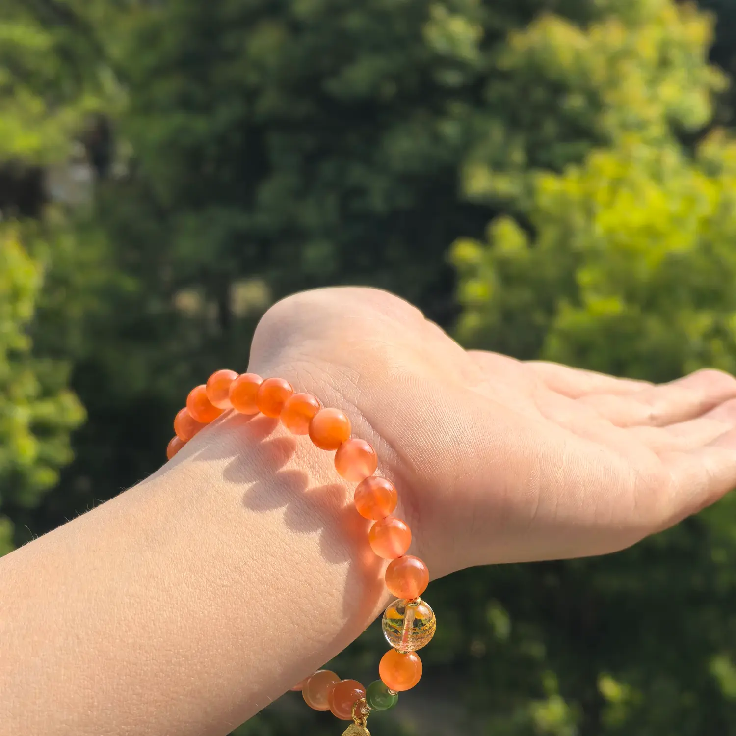 Rutilated Quartz Clear Quartz Jasper Bracelet worn on wrist in natural light | QZZEN