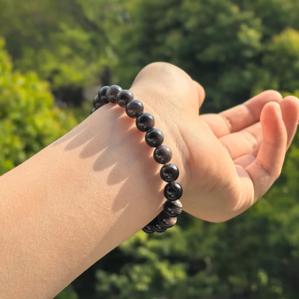 Silver Sheen Obsidian Clear Quartz Rune Bracelet styled view