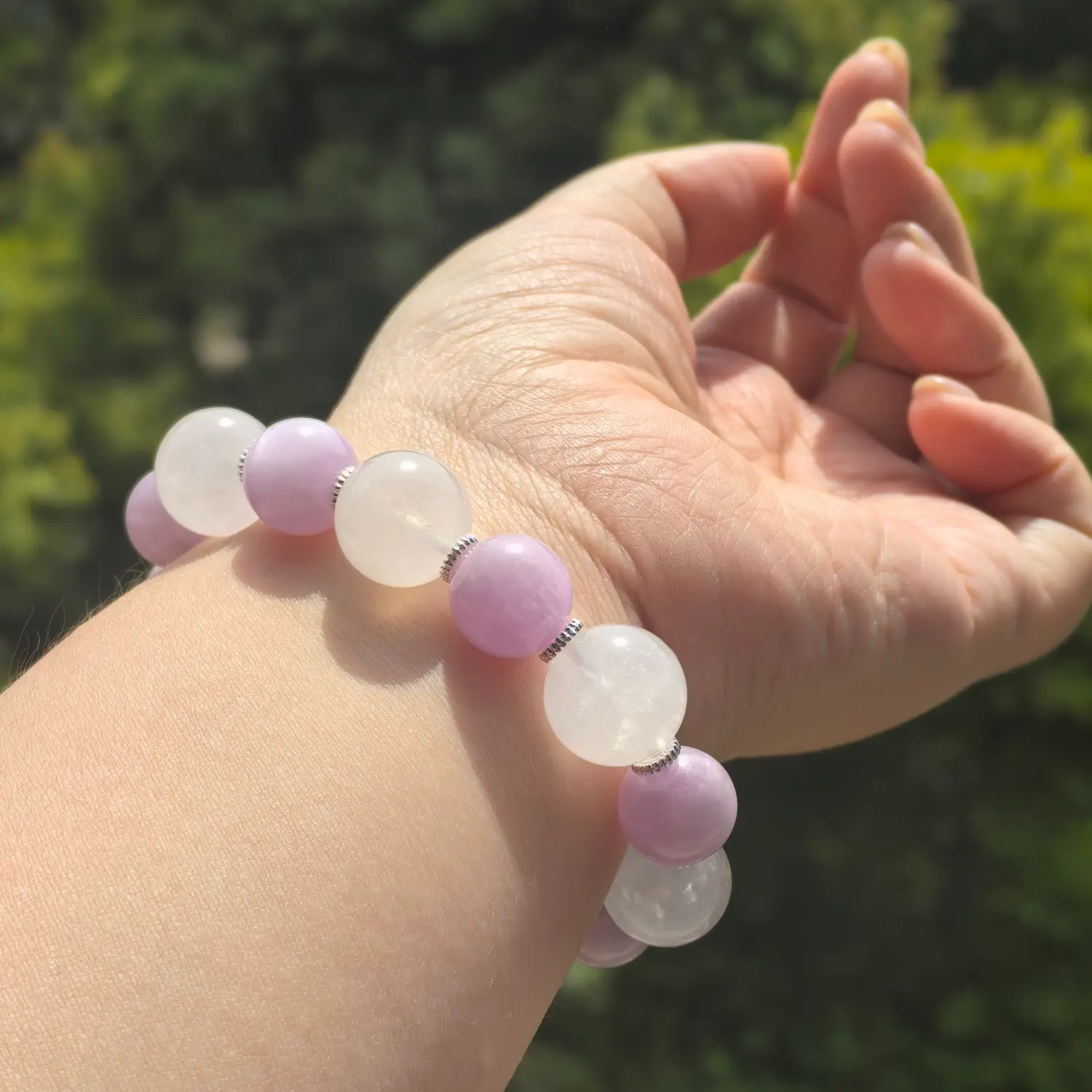 Rose Quartz Kunzite Bracelet worn on wrist in natural light | QZZEN