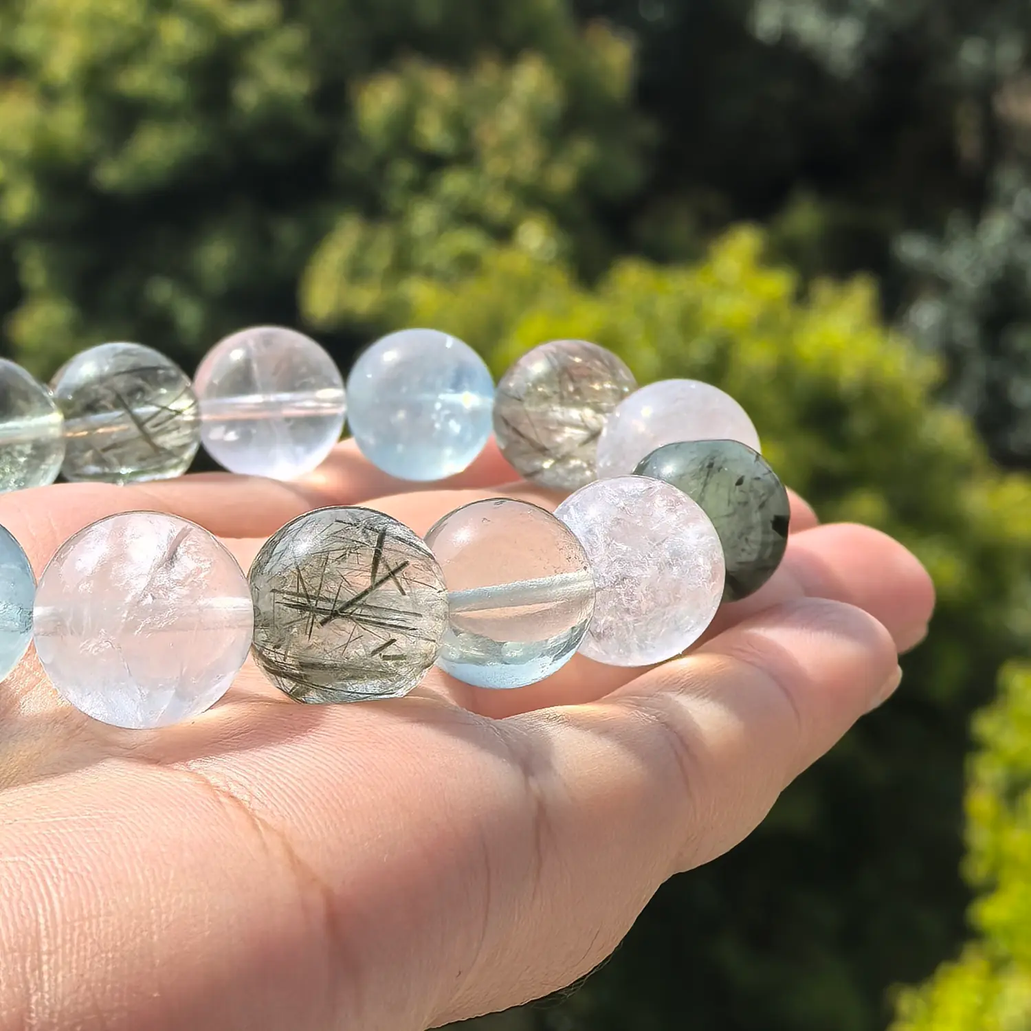 Clear Quartz Aquamarine Black Rutilated Quartz Bracelet bead texture close-up with natural inclusions | QZZEN