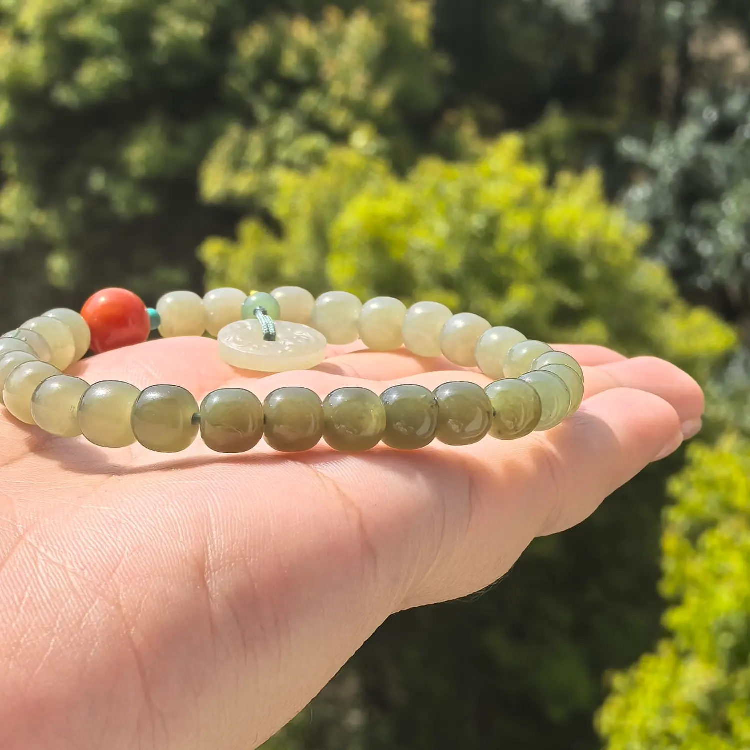 Red Agate Hetian Jade Nanhong Agate Bracelet bead texture close-up with natural inclusions | QZZEN