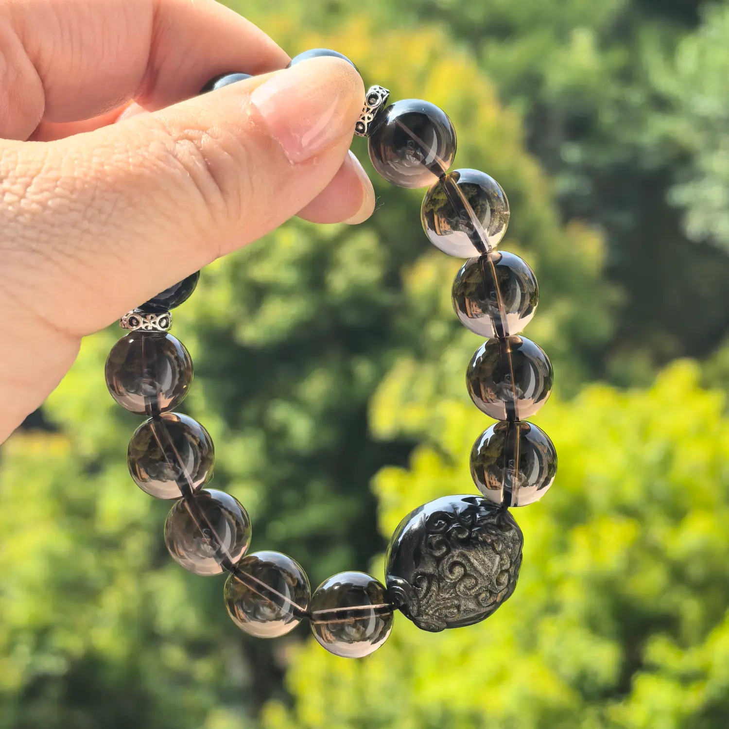 Obsidian Smoky Quartz Bracelet styled flat lay with calm ritual details | QZZEN