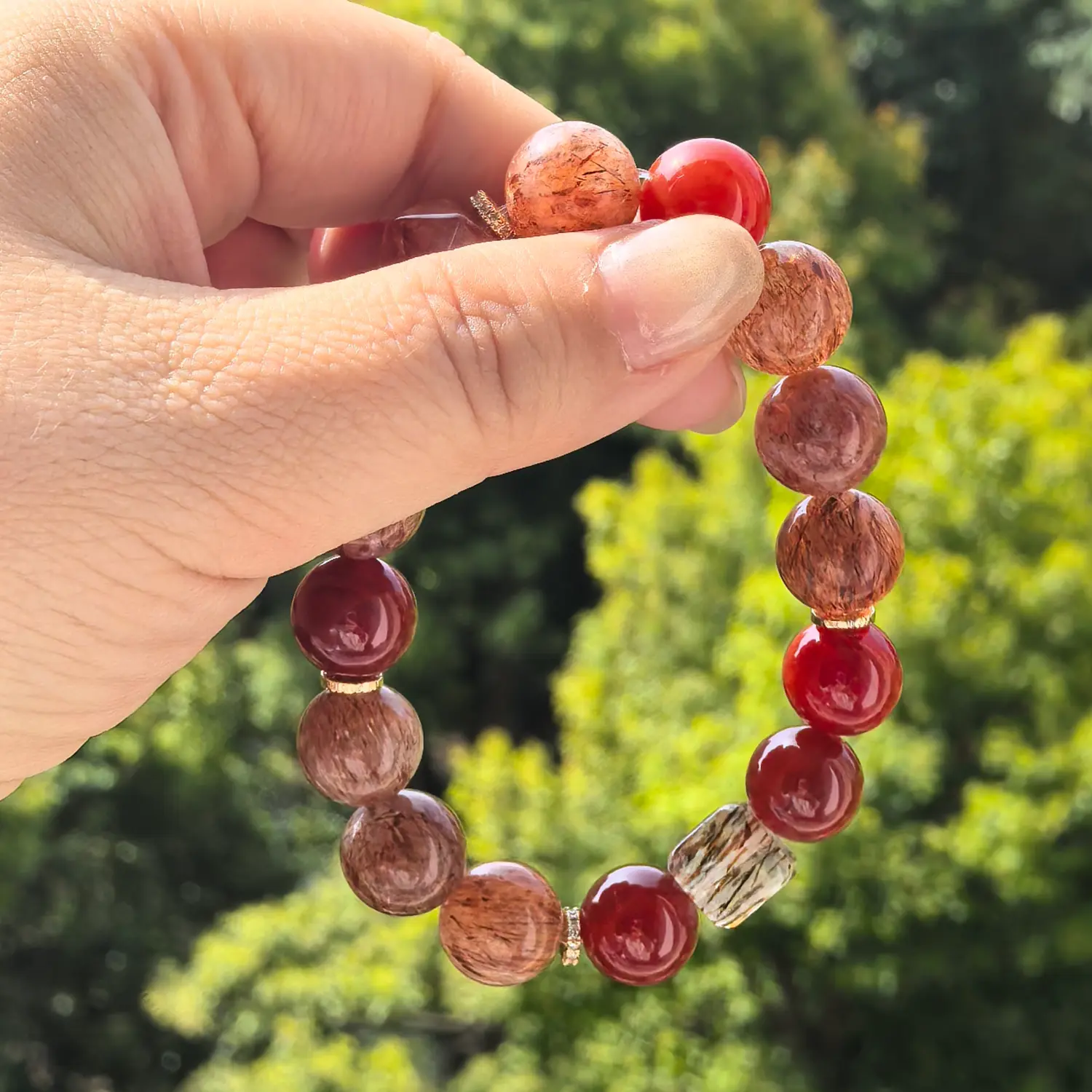 Copper Rutilated Quartz Red Agate Bracelet styled flat lay with calm ritual details | QZZEN