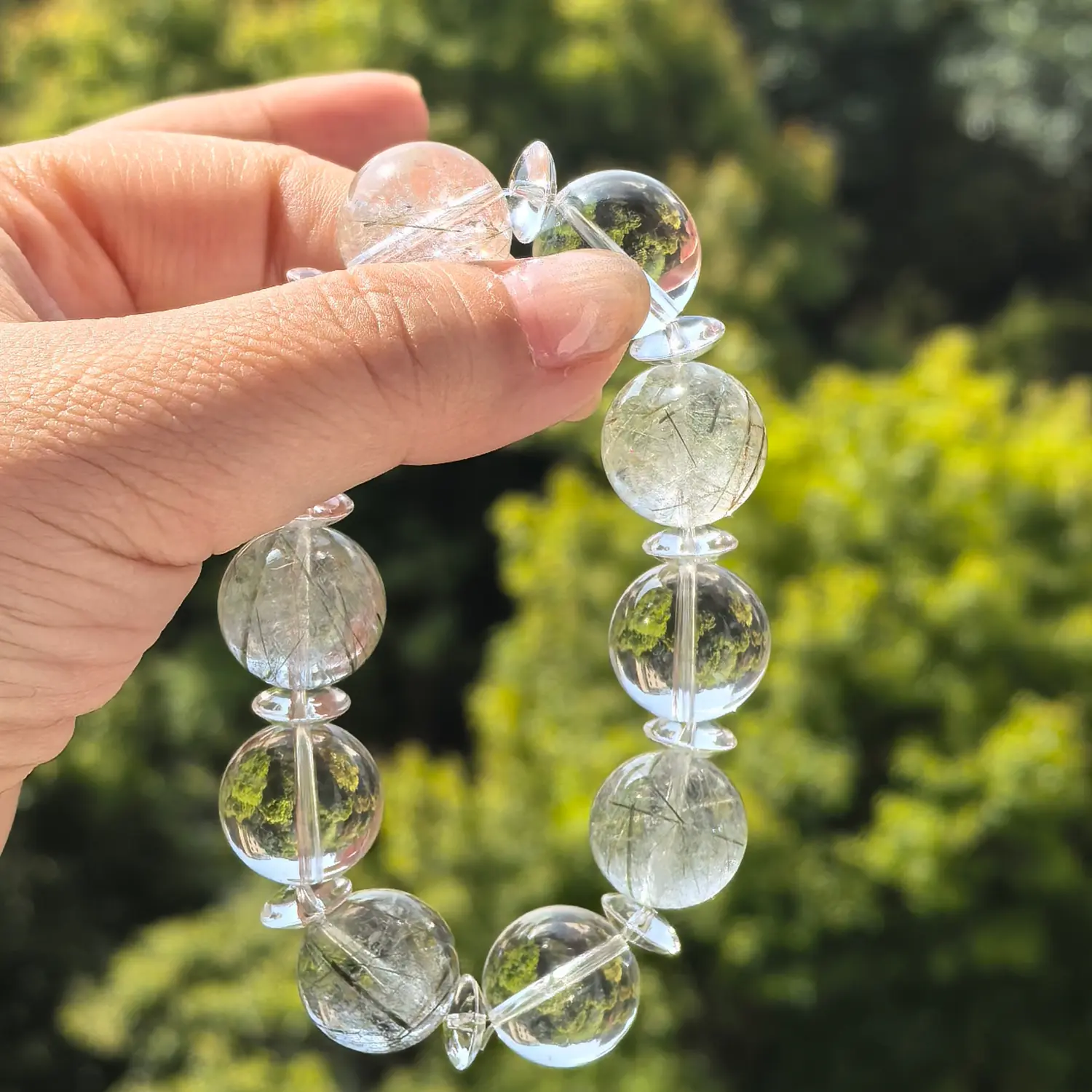 Clear Quartz Green Rutilated Quartz Bracelet styled flat lay with calm ritual details | QZZEN