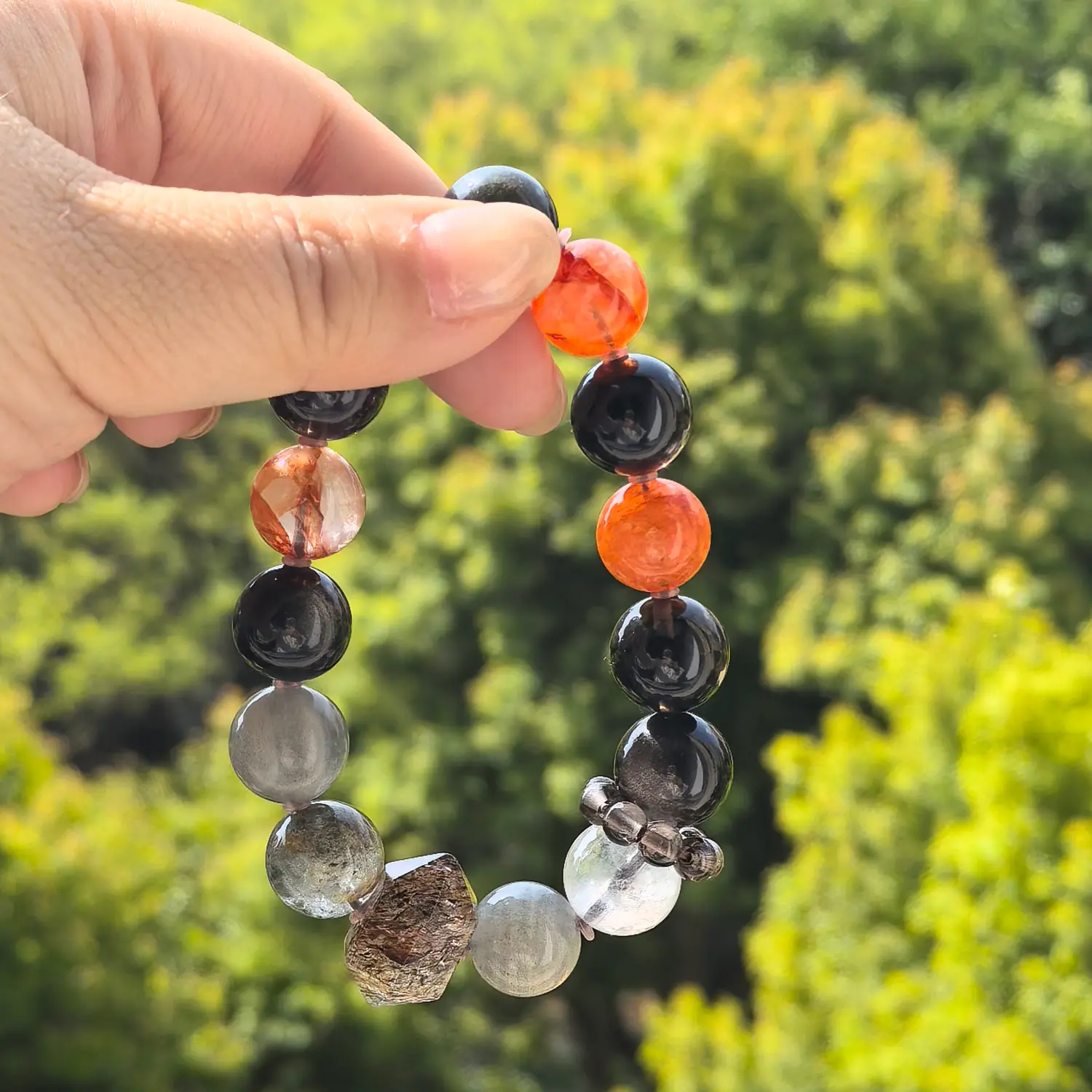 Clear Quartz Obsidian Red Hematoid Quartz Bracelet styled flat lay with calm ritual details | QZZEN