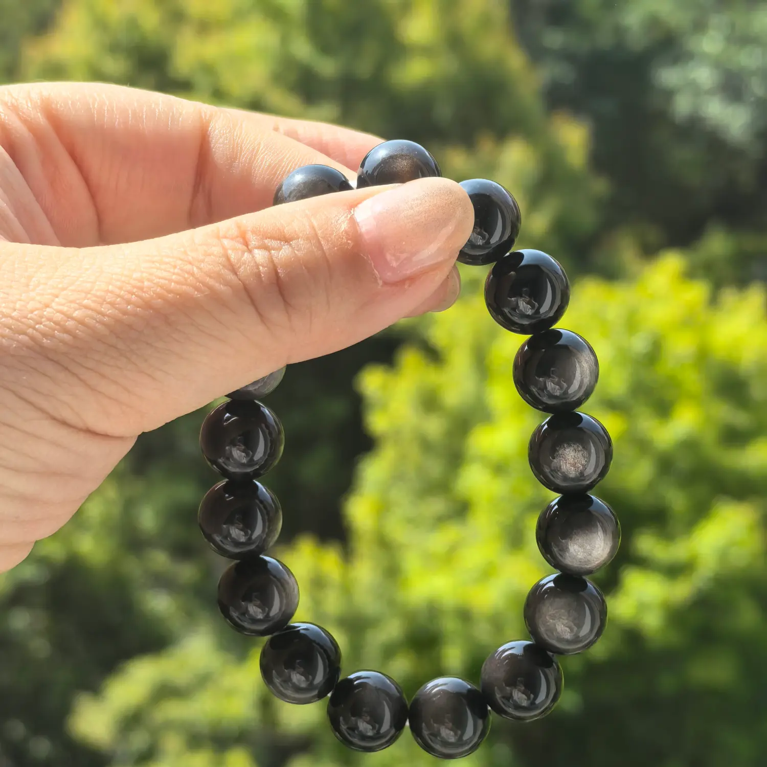 Silver Obsidian Bracelet styled flat lay with calm ritual details | QZZEN