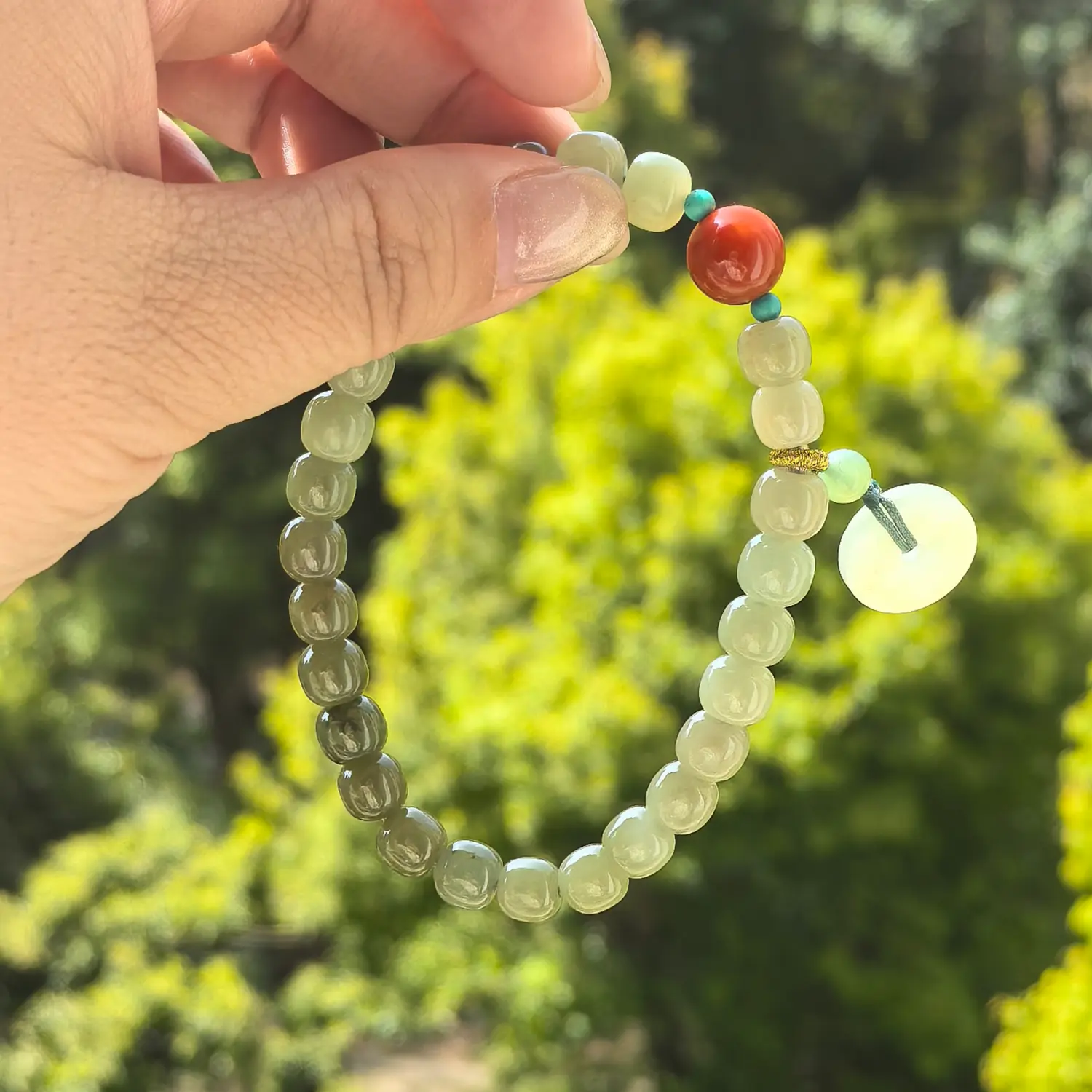 Red Agate Hetian Jade Nanhong Agate Bracelet styled flat lay with calm ritual details | QZZEN