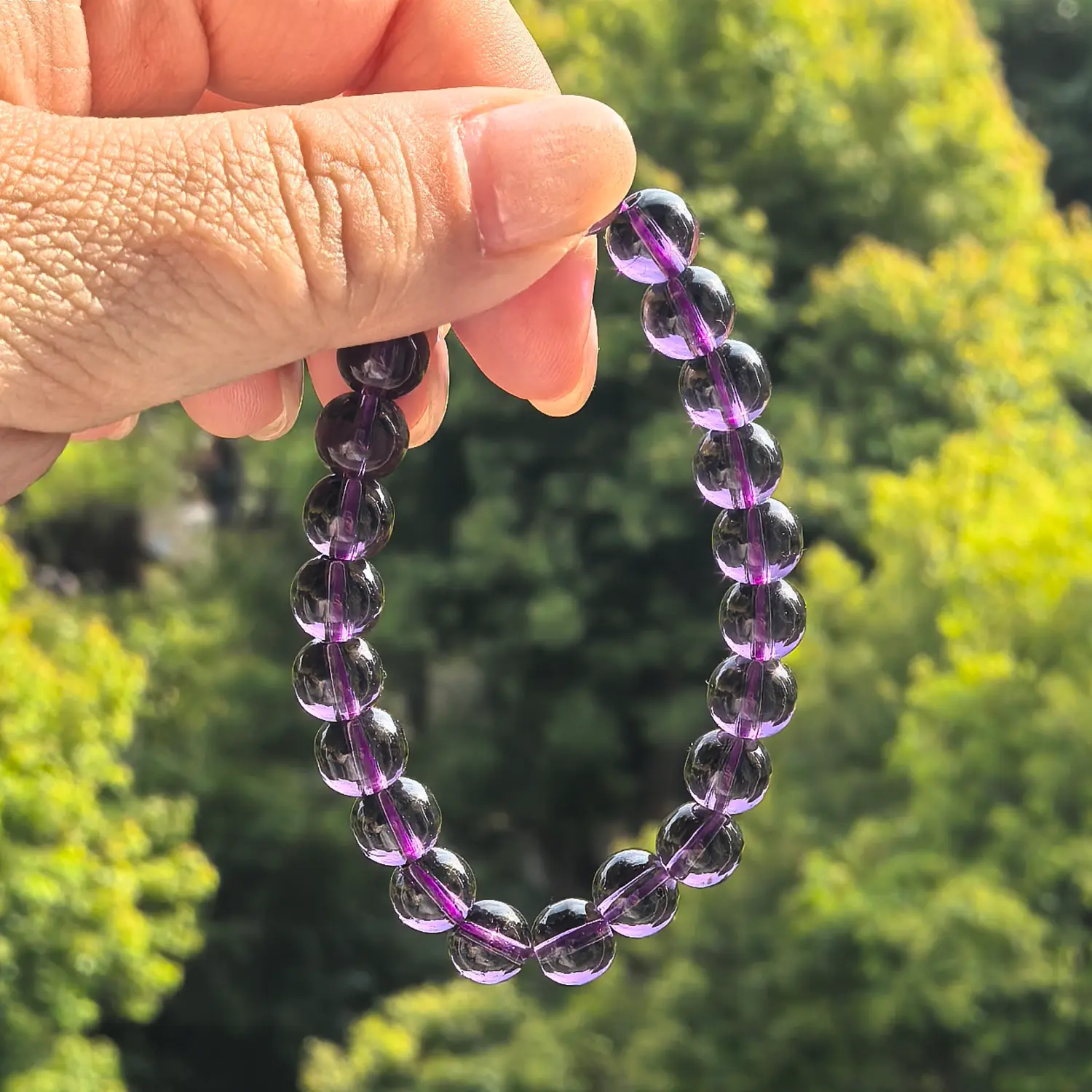 8mm Amethyst Bracelet styled flat lay with calm ritual details | QZZEN